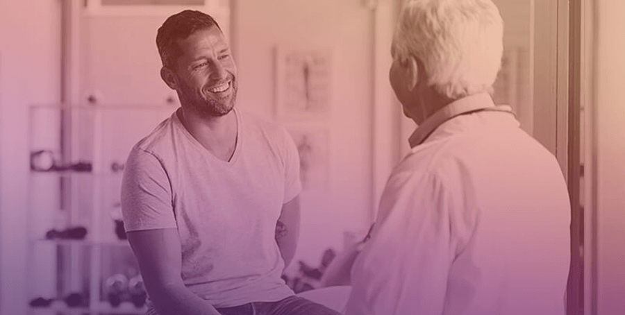 Man speaking with doctor