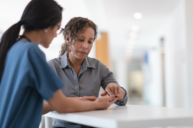 healthcare provider talking to patient