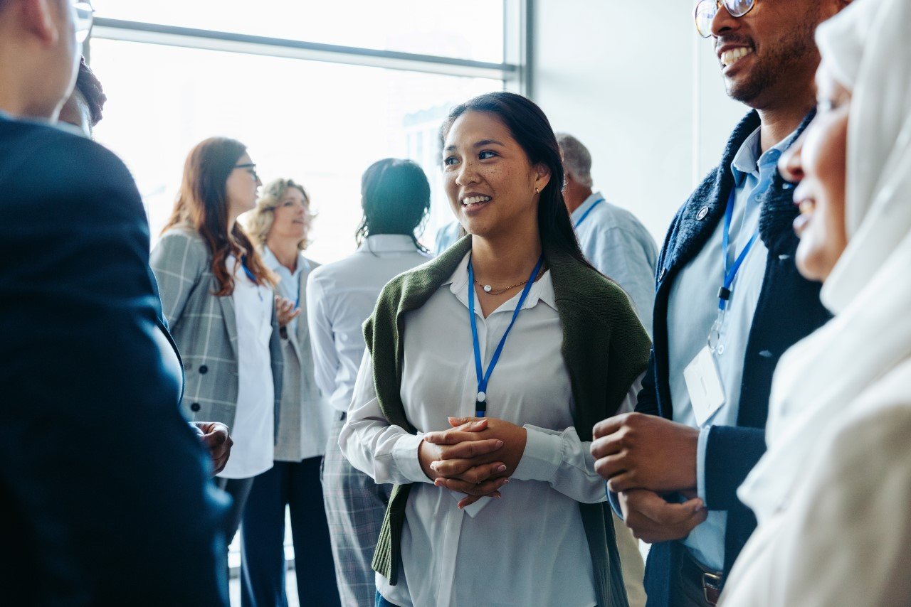 A group of people engaging in friendly conversation