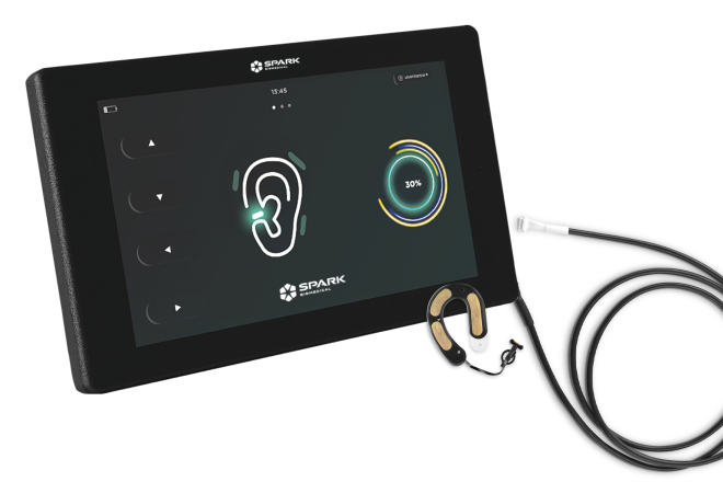 spark medical device with tablet screen showing drawing of each and 30% status
