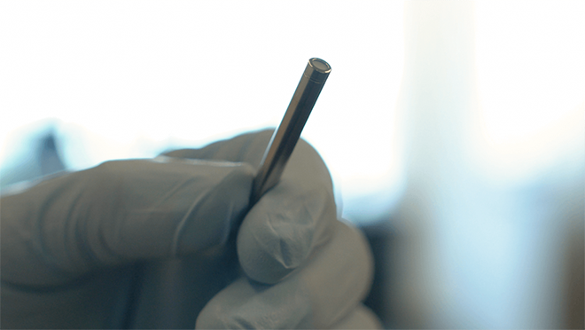 Titanium implant that releases medication treatment for opioid use disorder.