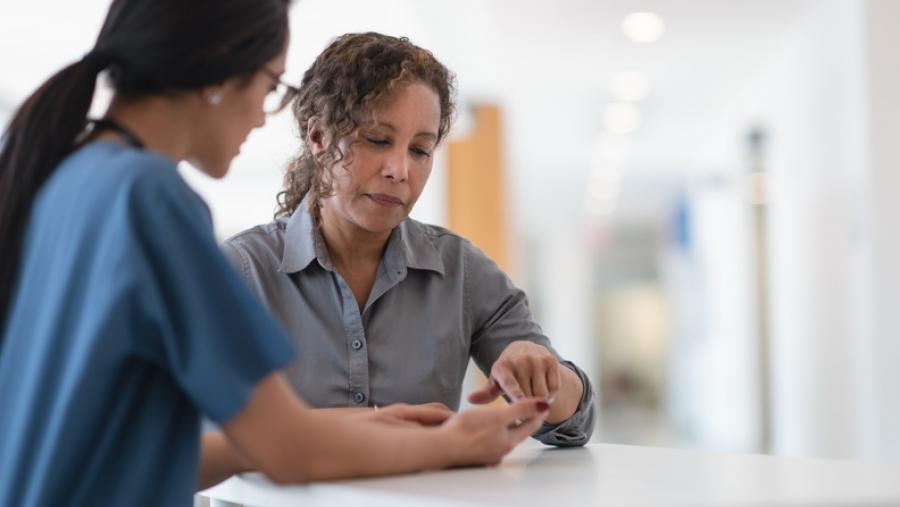 healthcare provider talking to patient